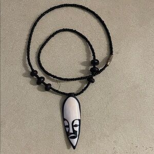 Black Beaded Necklace with Tribal Pendant